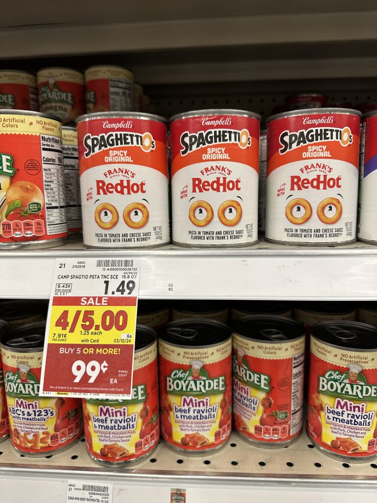 Spaghetti and meatballs are on sale at a grocery store.
