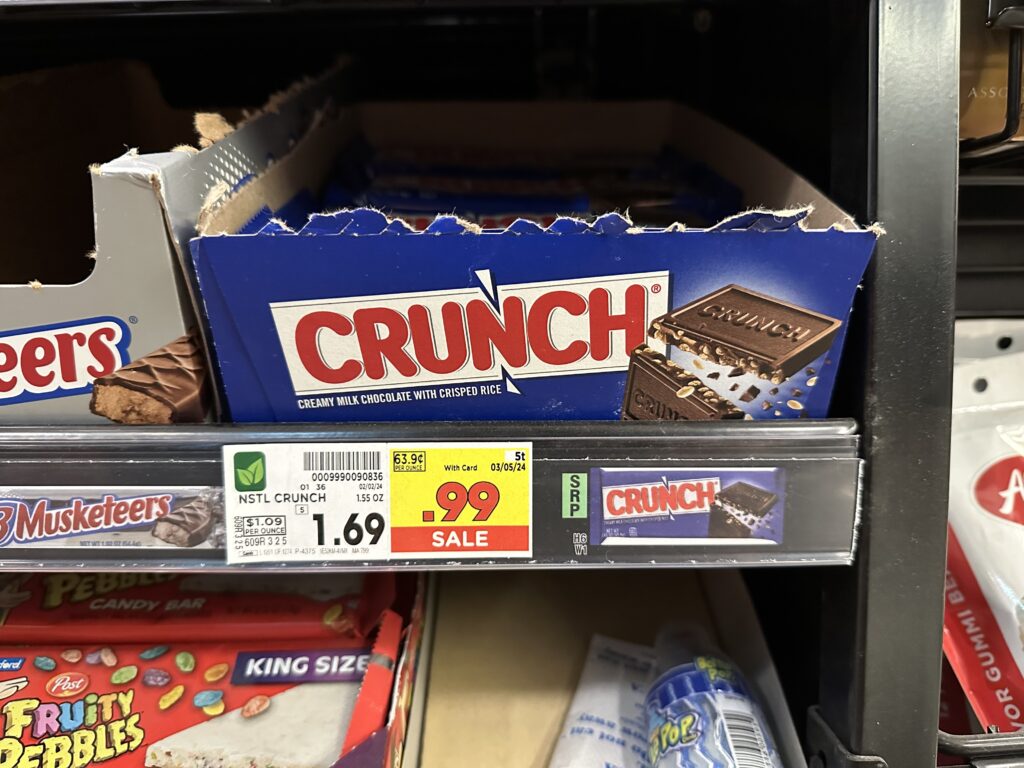Crunch bars are on display in a grocery store.